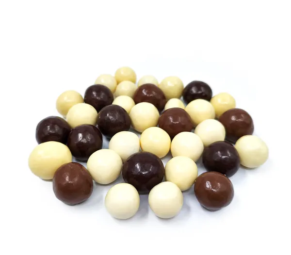 Hazelnut mix covered with white milk and dark chocolate, kg D
