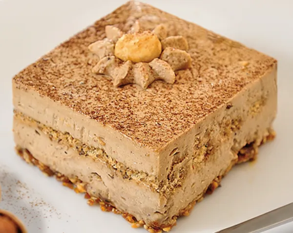 Frozen hazelnut semifreddo DOLCERIA ALBA, with hazelnut meringue, slic